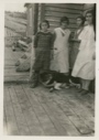 Image of Four young girls with dog